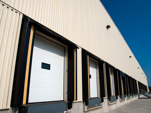 Warehouse loading dock and overhead doors